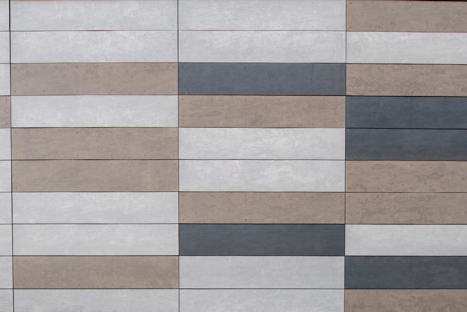 Close up of a fiber cement wall finish.